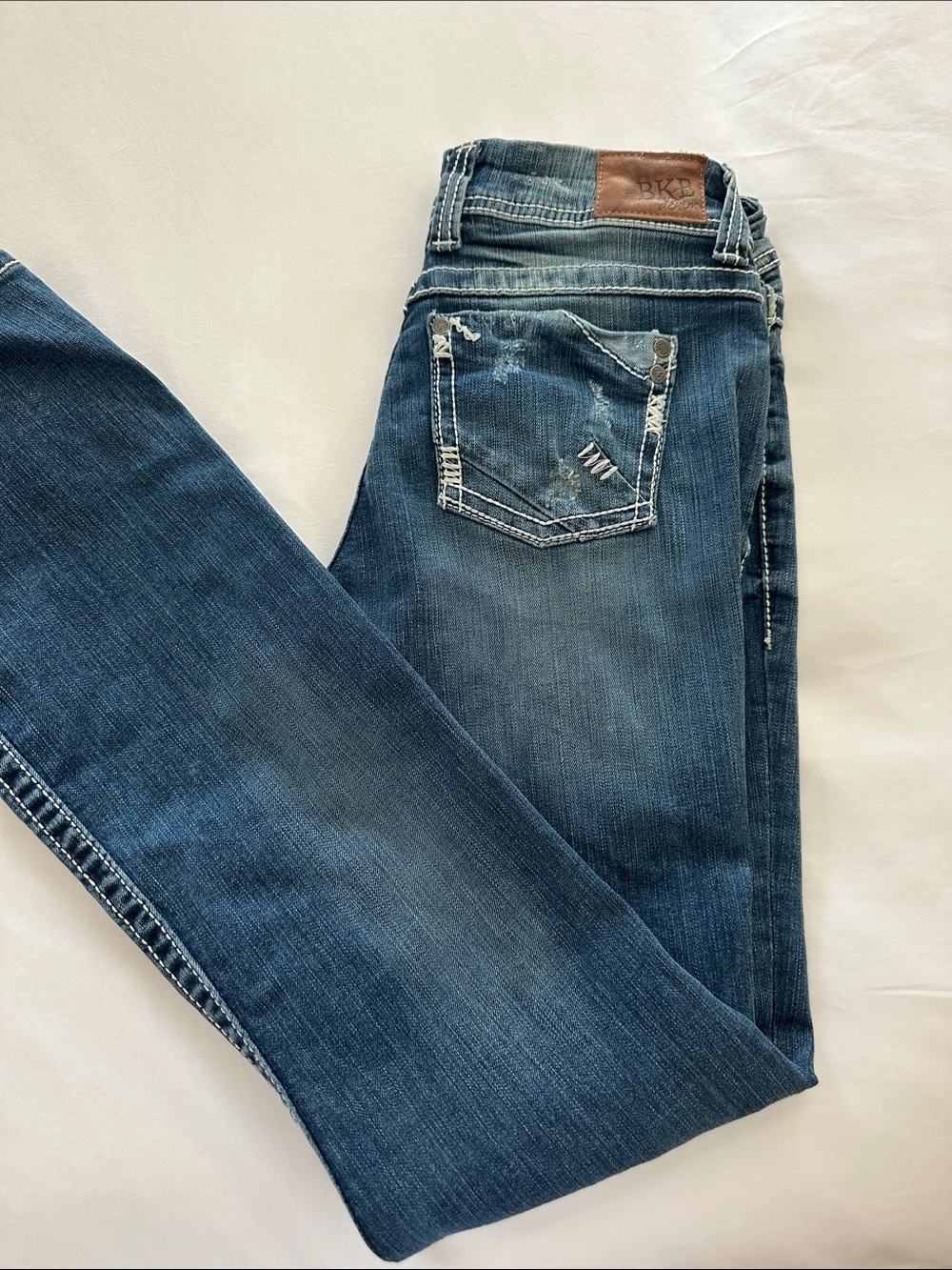 Women’s BKE purposefully Distressed BOOTCUT Jeans